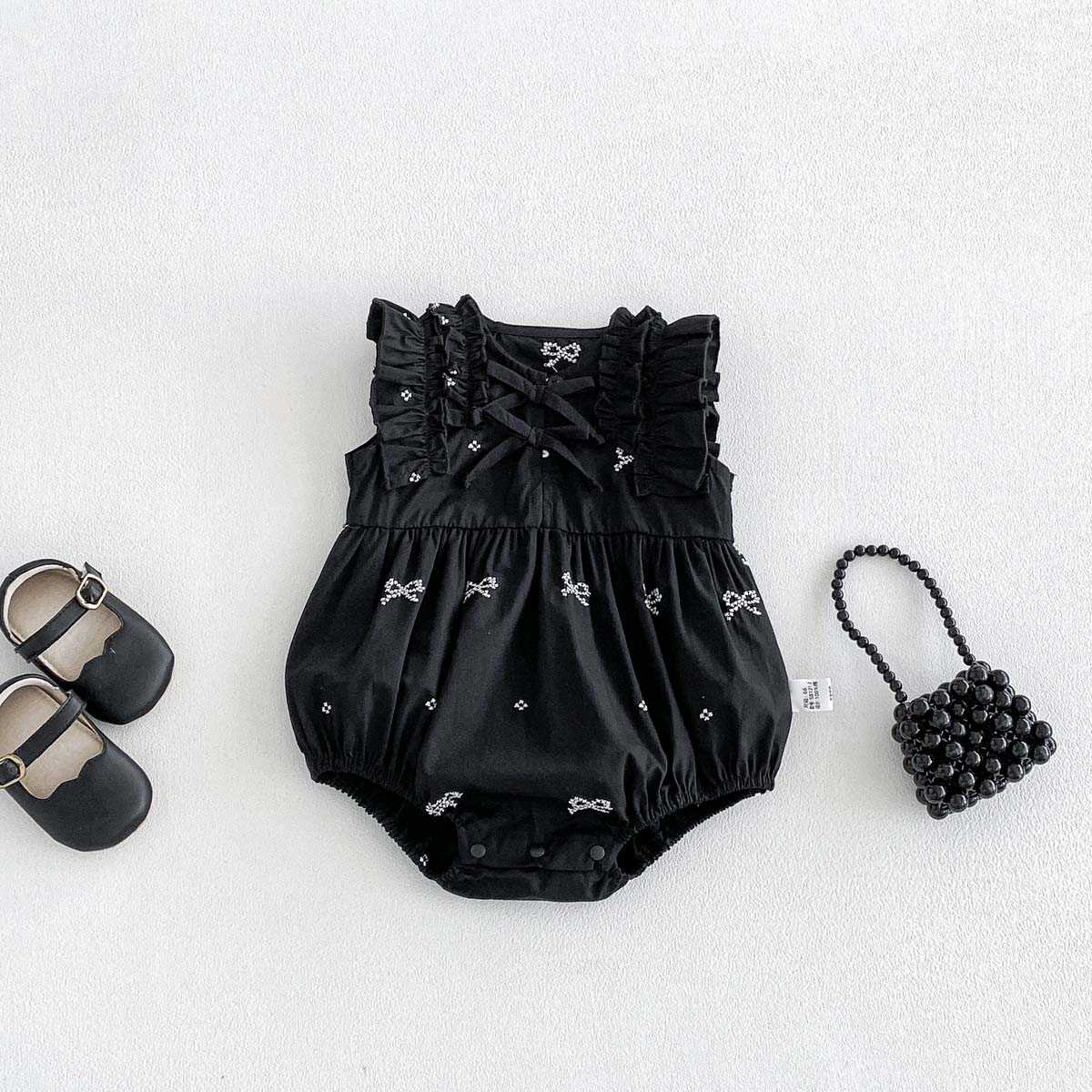 Combinaison noire à imprimé nœ - Baby Clothing Online avis et prix
